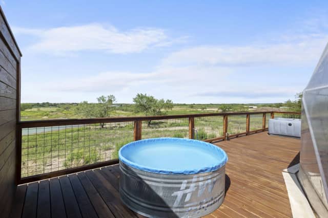Cowboy pool overlooking Texas landscape