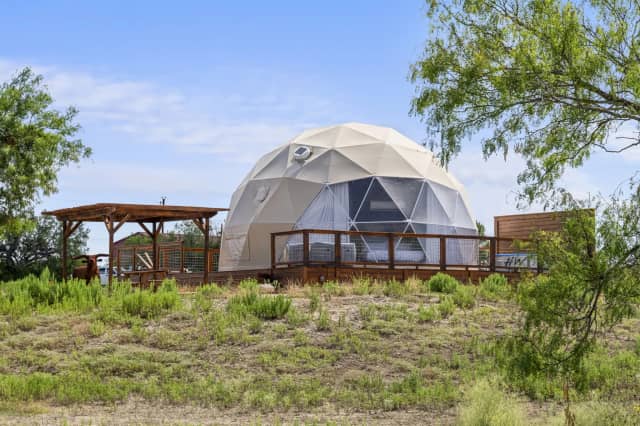 Full dome exterior with covered seating