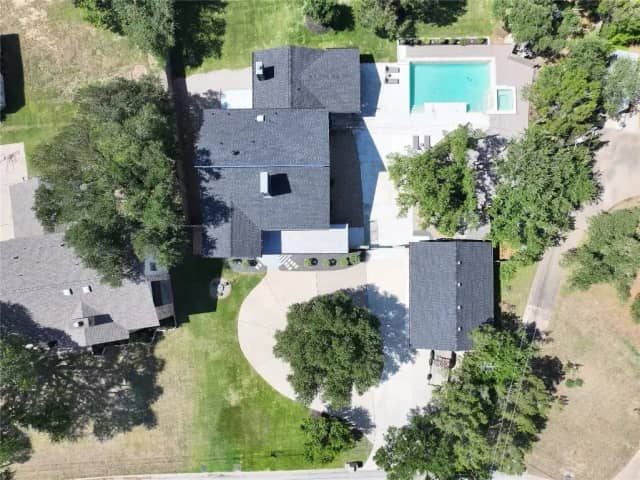 Aerial view showing pool and property layout