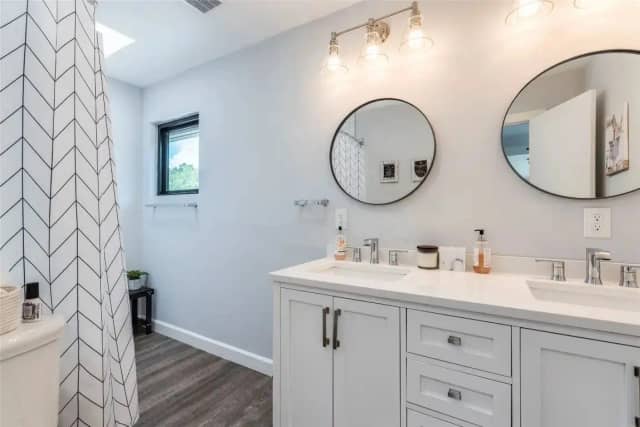 Guest bathroom with white vanity