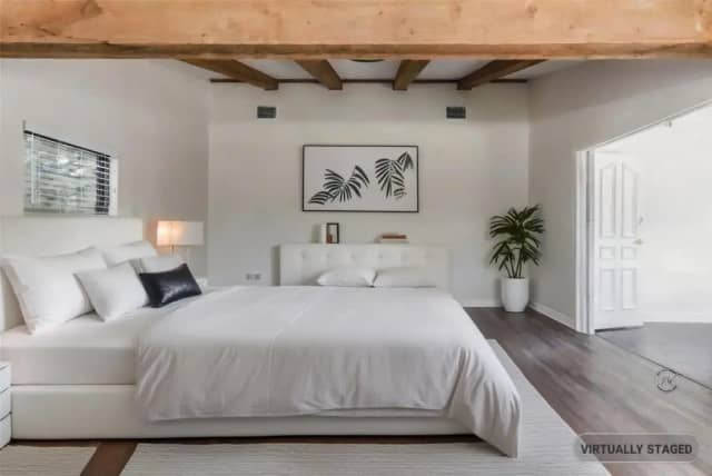 Bedroom with exposed beams