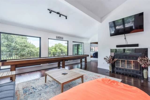 Game room with TV and Hill Country views