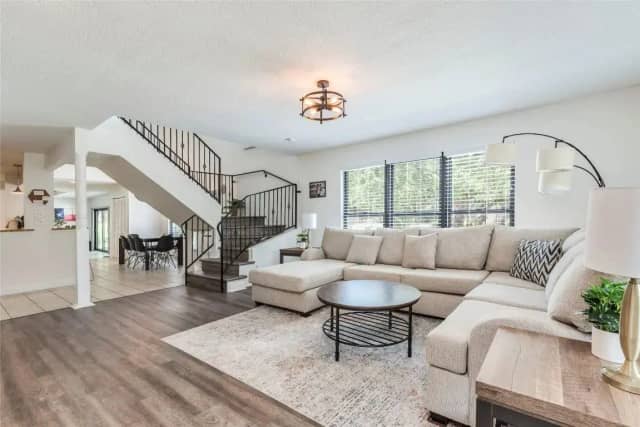 Open living room with staircase